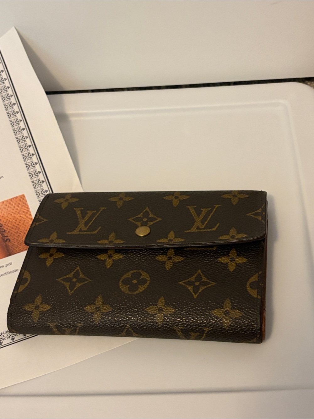 Louis Vuitton Monogram Porte Monnaie Wallet in Brown
